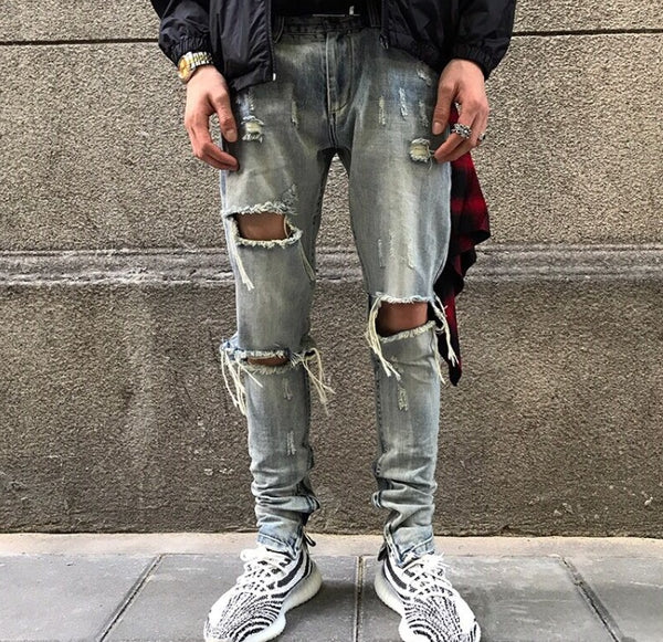 Washed holes in jeans, men and women GRE hip hop street trend stars with the same paragraph